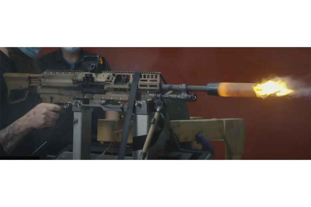 Sig Sauer officials test firing the auto rifle prototype of their NGSW prototype. (Courtesy Sig Sauer)