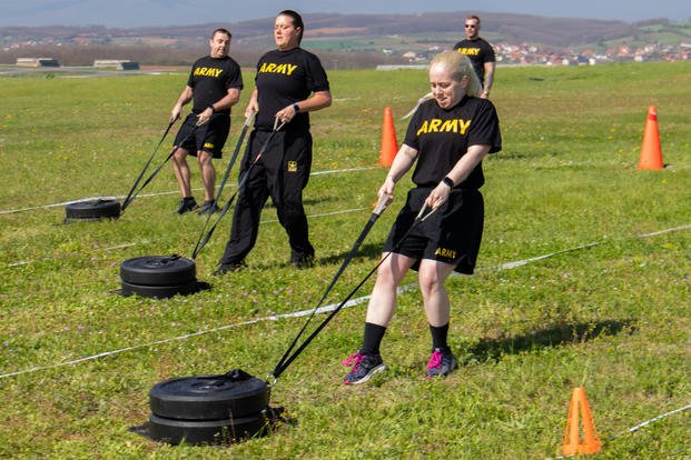 female soldier pulls 90-pound sled during an Army Combat Fitness Test 3.0 Certification Course