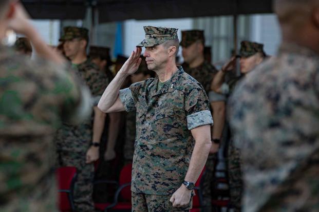 U.S. Marine Corps Maj. Gen. Robert Castellvi salutes.