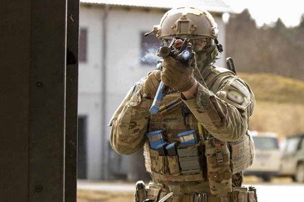 Airman engages targets during close quarters battle training