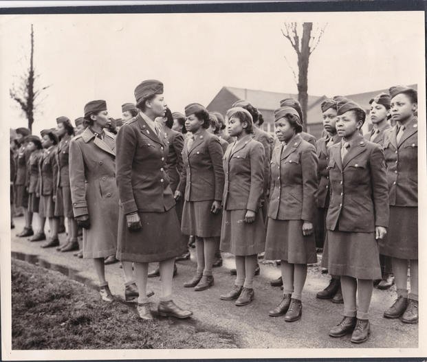 members of the 6888th battalion stand in formation in Birmingham, England, in 1945