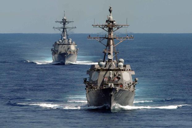 The USS Bulkeley and USS Mason participate in a strait transit exercise.