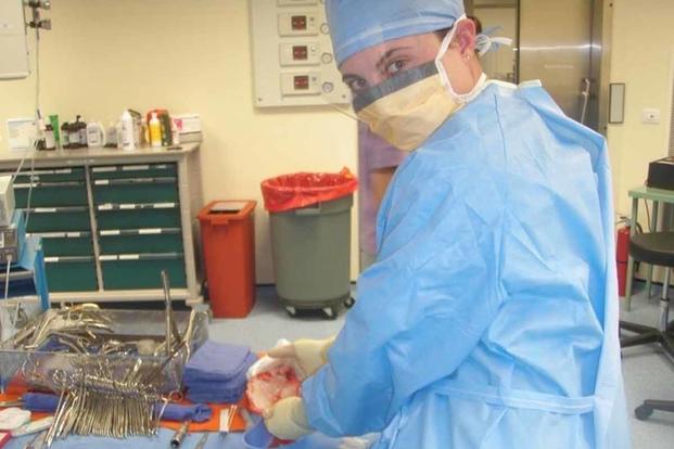 Jen Burch assists with a craniotomy 