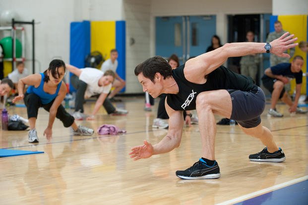 Airmen work out with renowned fitness trainer Tony Horton.