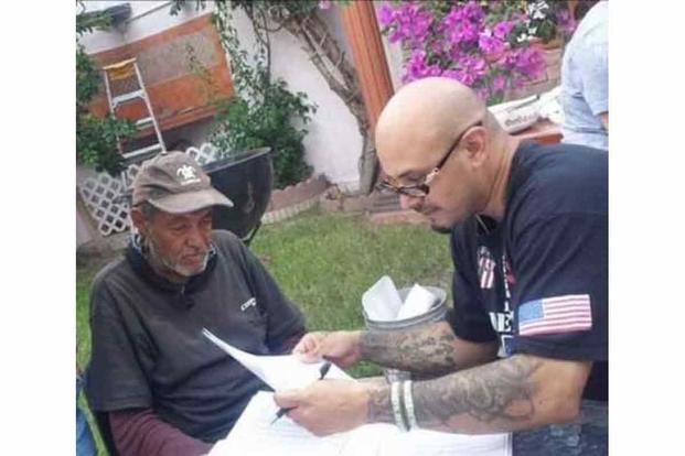 Ivan Ocon helps deported Vietnam War vet file for his VA disability benefits. 