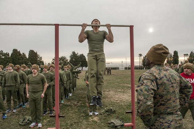 Marine officer candidates complete physical fitness test.