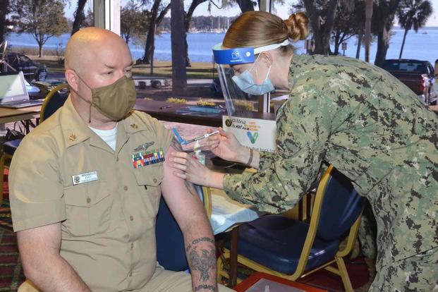 U.S. Navy sailor gets a COVID-19 vaccine at Naval Submarine Base Kings Bay
