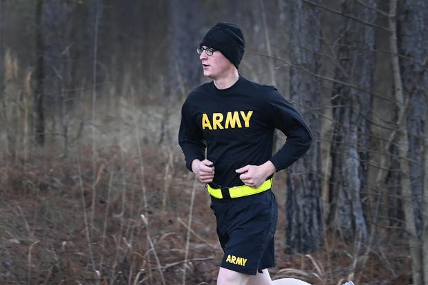 A civil affairs candidate runs as part of his physical fitness test.