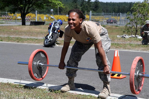 An Army sergeant attempts a hang clean.