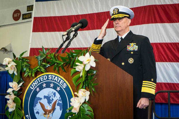Adm. Christopher W. Grady, commander, U.S. Fleet Forces Command (USFFC) renders a salute