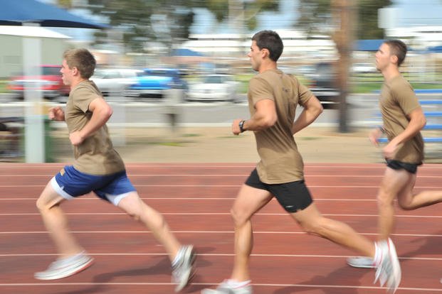Midshipmen take part in a 1.5-mile run.