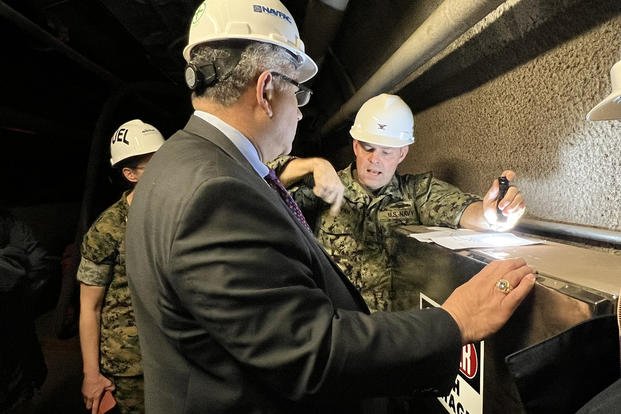Navy Secretary Carlos Del Toro tours the water system facility at Red Hill.
