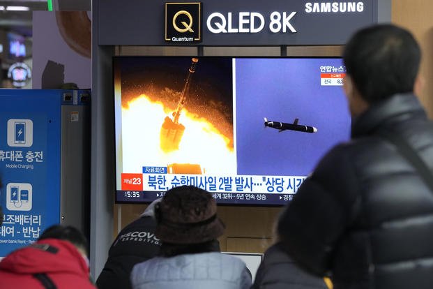 images of North Korea's missile launch during a news program at the Seoul Railway Station in Seoul