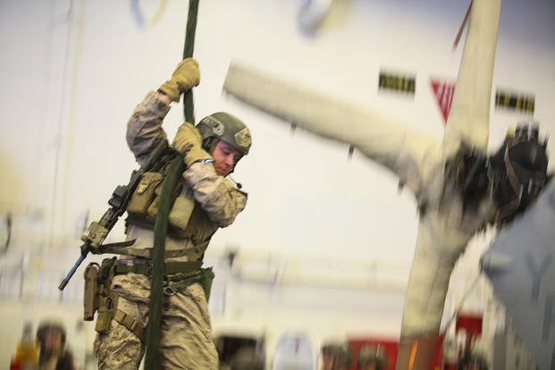 Marines conduct fast-rope training.