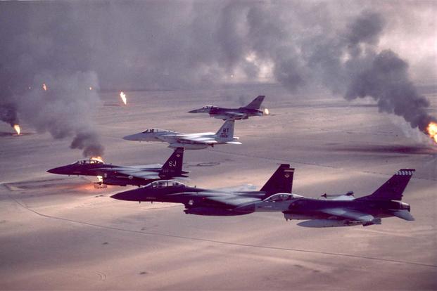 Fighter aircraft over burning oil fields in Kuwait during Operation Desert Storm