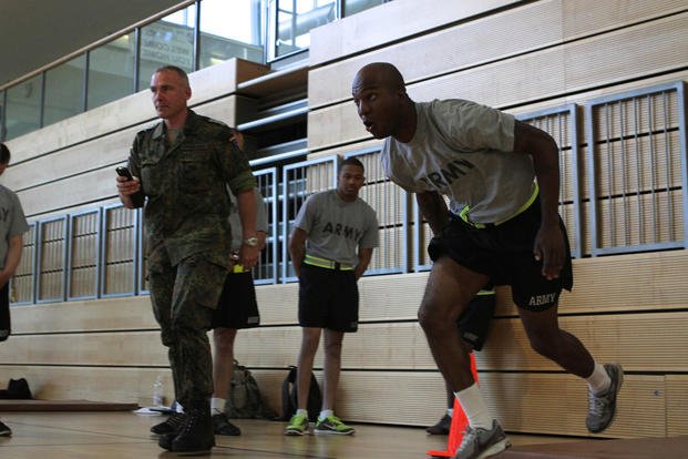 A soldier runs during German Armed Forces Proficiency Badge testing.