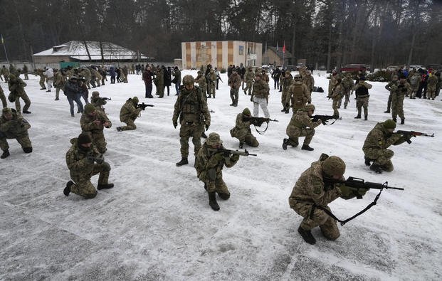 Members of Ukraine's Territorial Defense Forces, volunteer military units of the Armed Forces, train