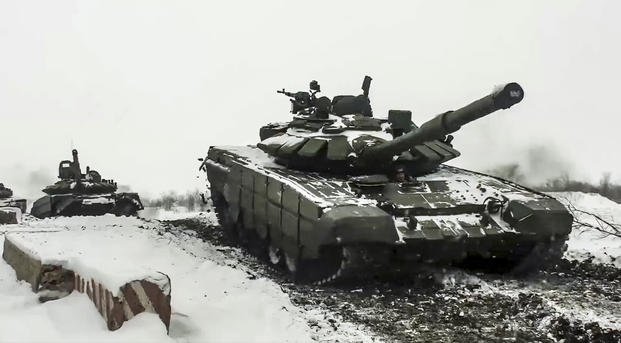 Russian tanks roll during a military exercising.