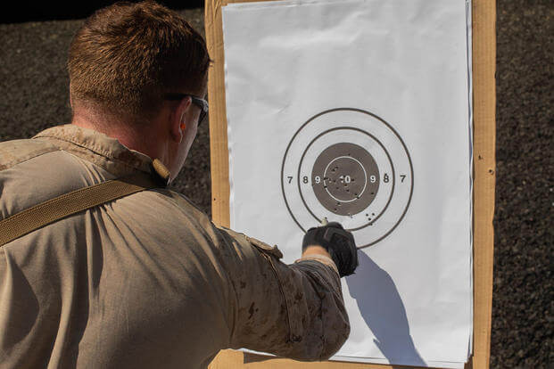 A Marine scores his target.