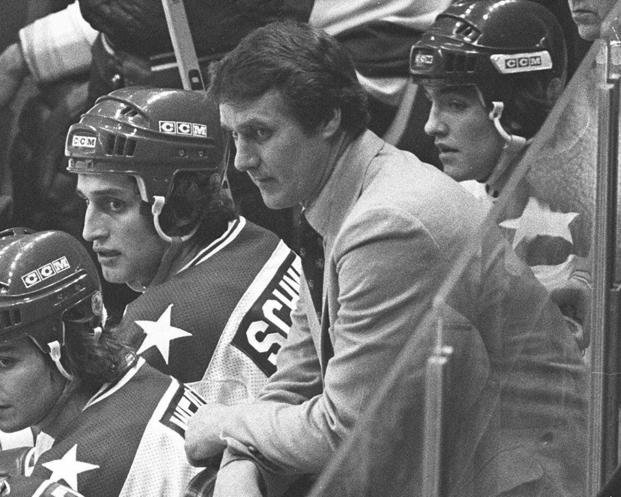 USA coach Herb Brooks, center, looks on from the bench during the closing minutes of the semifinal game against the U.S.S.R at the 1980 Winter Olympic Games in Lake Placid, N.Y.