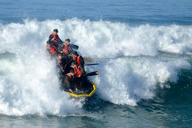 Basic Underwater Demolition/SEAL students participate in surf passage at Naval Amphibious Base Coronado, California.