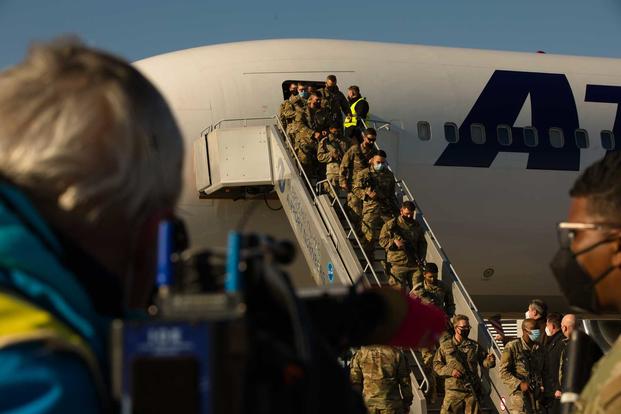 U.S. Army Soldiers arrive at Nuremburg Airport in Germany.