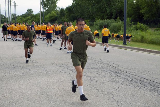 Naval ROTC midshipman candidates participate in a timed run as part of NROTC new student indoctrination.