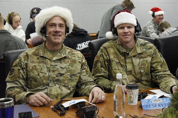 Two colonels volunteer as official NORAD Santa trackers.
