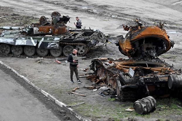 Destroyed Russian tank on the outskirts of Buzova village, Ukraine.