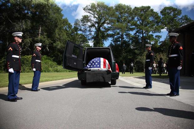 U.S. Marines perform a burial ceremony.