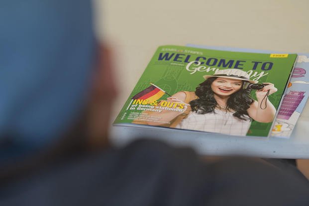 An issue of Stars and Stripes magazine “Welcome to Germany” sits on a newcomer’s desk. 