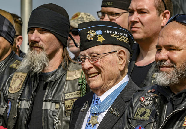 Hershel "Woody" Williams stands with fellow Marines.