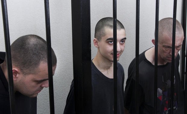 British and Moroccan prisoners behind bars in Ukraine.