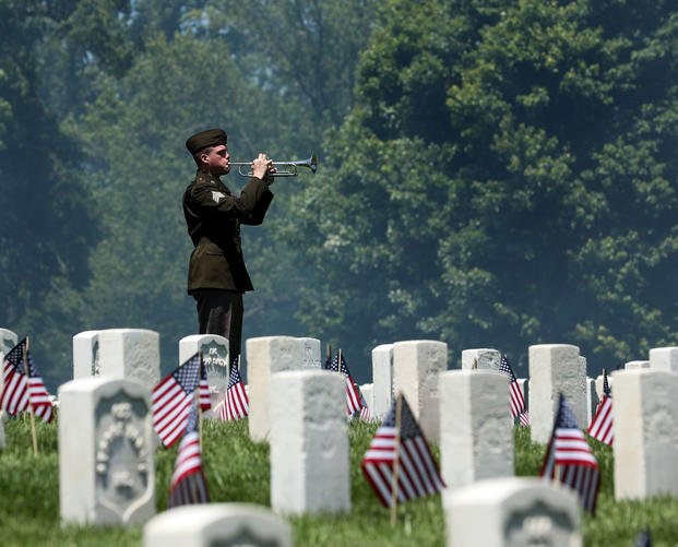 Troops honor service members during Memorial Day