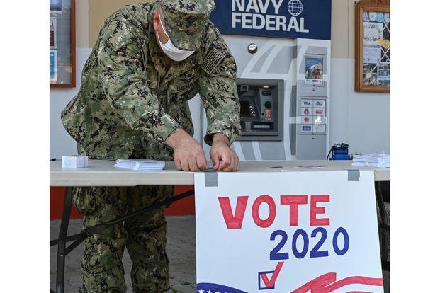 Naval Air Station (NAS) Sigonella Voting Assistance Officer Lt. j.g. Timothy Martin