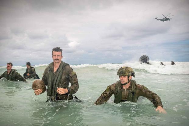 Australian Army soldiers return to shore after training with U.S. Marines.