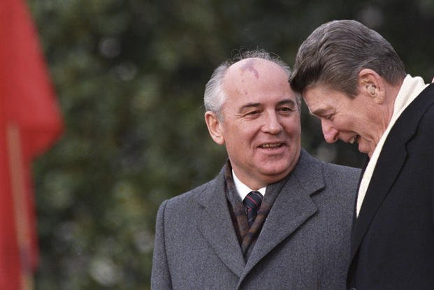 President Ronald Reagan talks with Soviet leader Mikhail Gorbachev.