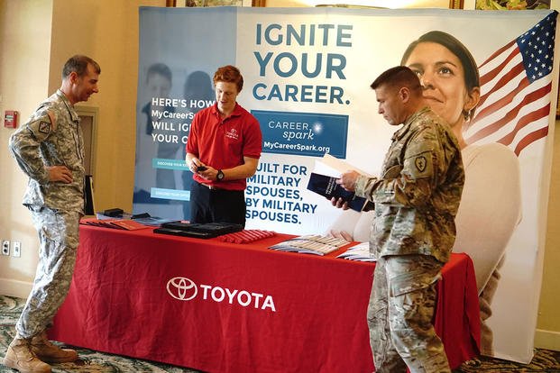 Soldiers learn about job opportunities at the Hawaii Transition Summit at Schofield Barracks.