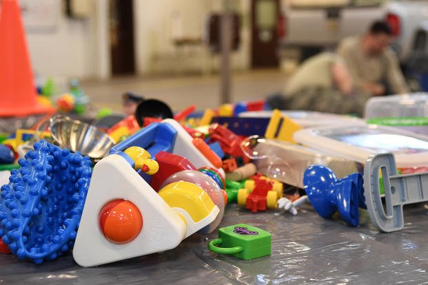 Toys are sanitized at a child development center.