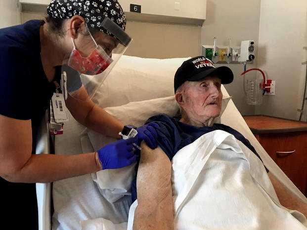 Veteran receives COVID-19 vaccine at the Veterans Affairs agency in Phoenix.