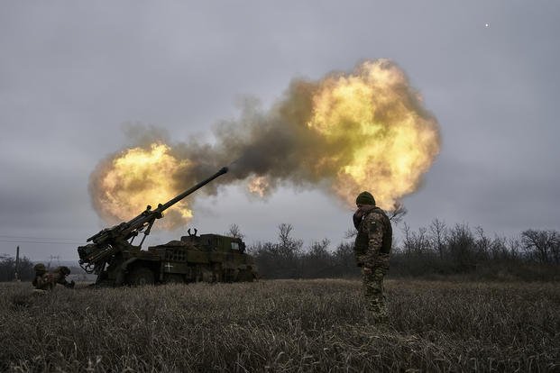 Ukrainian soldiers fire a French-made CAESAR self-propelled howitzer toward Russian positions near Avdiivka, Donetsk region, Ukraine.