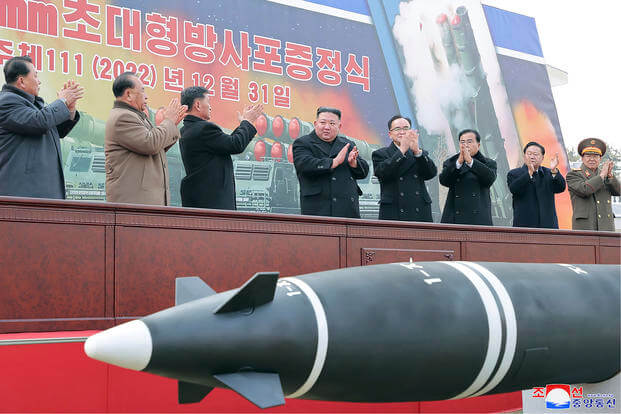 Kim Jong Un attends a ceremony of donating 600mm super-large multiple launch rocket system