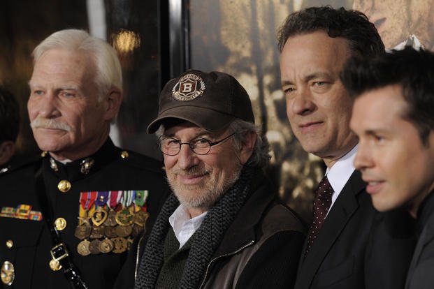 Steven Spielberg, second from left, and Tom Hanks, second from right, poses with U.S. Marine Capt. Dale Dye, far left, and cast member Jon Seda at the premiere of the 10-part HBO miniseries, ‘The Pacific,’ in Los Angeles.