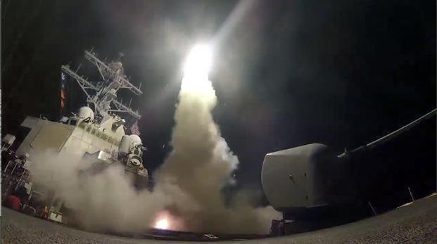 guided-missile destroyer USS Porter launches a tomahawk land attack missile in the Mediterranean Sea