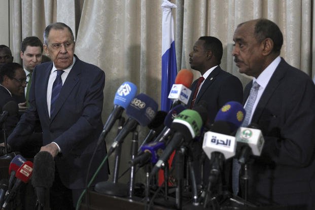 Russian Foreign Minister Sergei Lavrov, left, and Sudanese acting foreign minister Ali al-Sadiq