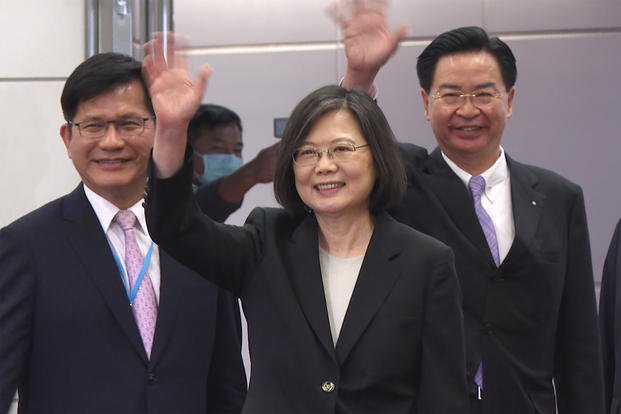 Taiwan's Presidential office secretary general Lin Chia-lung, left, President Tsai Ing-wen, center, and Foreign Minister Joseph Wu