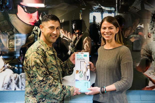 April Mitchell, an entrepreneur and military spouse, speaks with Marines at Wounded Warriors Battalion-West on Marine Corps Base Camp Pendleton, California.