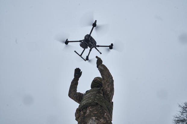 A Ukrainian soldier launches a drone near Avdiivka, Donetsk region, Ukraine.