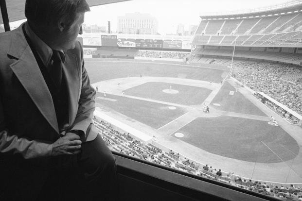 New York Yankees owner George Steinbrenner watches his team play the Toronto Blue Jays at Yankee Stadium.