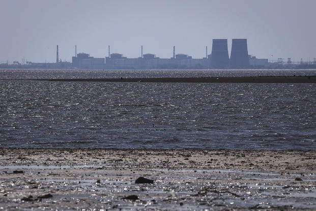 The Zaporizhzhia nuclear power plant, Europe's largest, is seen in the background.
